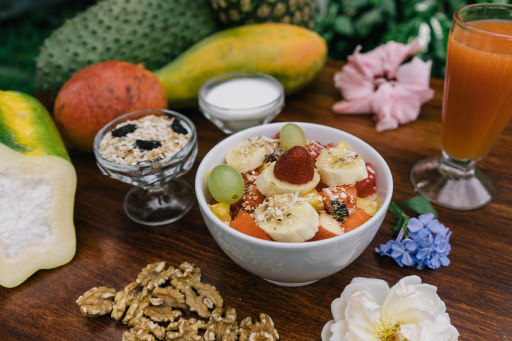 Fresh fruit salad with home made granola and yogurt